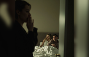 I opened the bedroom door—and the world stopped breathing. There he was, my husband, wrapped in sheets that didn’t belong to us. And beside him… her. My daughter’s best friend. But what broke me wasn’t what they did. It was the way she smiled—calm, certain, like she’d been waiting for me to see it. I didn’t shout. I didn’t cry. I just closed the door. By dawn, they learned what silence can do to a guilty heart.